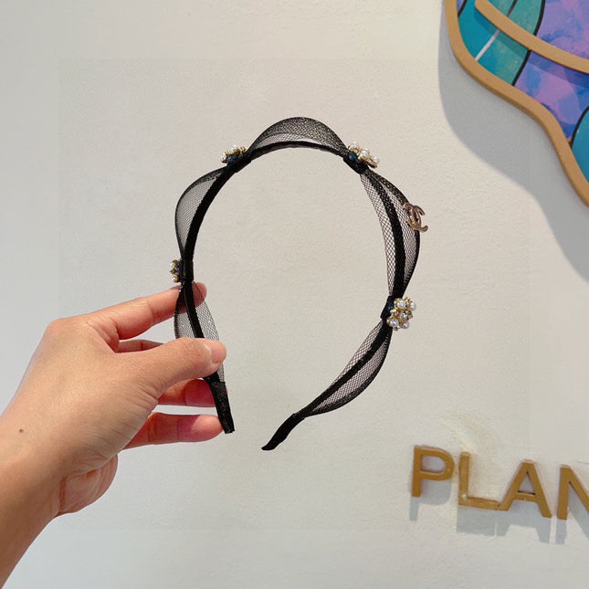 BLACK VOILE FABRIC WITH FLOWER 409382