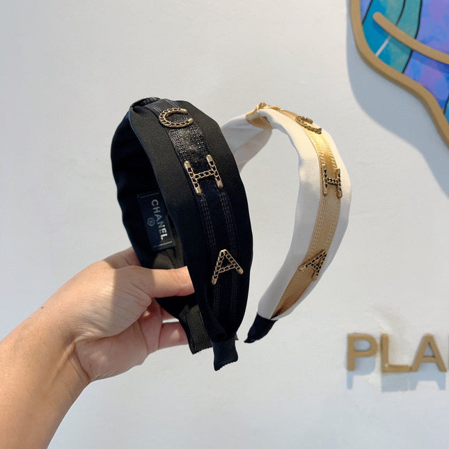 BLACK SILK HAIRBAND WITH GOLD LOGO 412441