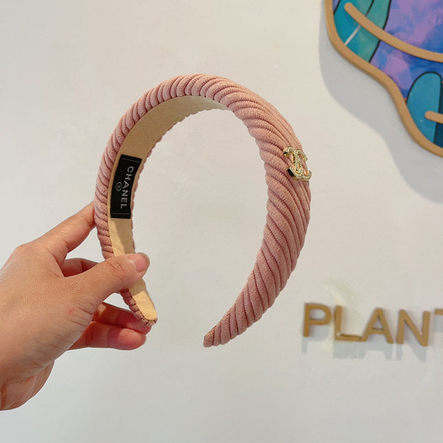 LIGHT PINK FABRIC HAIRBAND WITH GOLD LOGO 414436