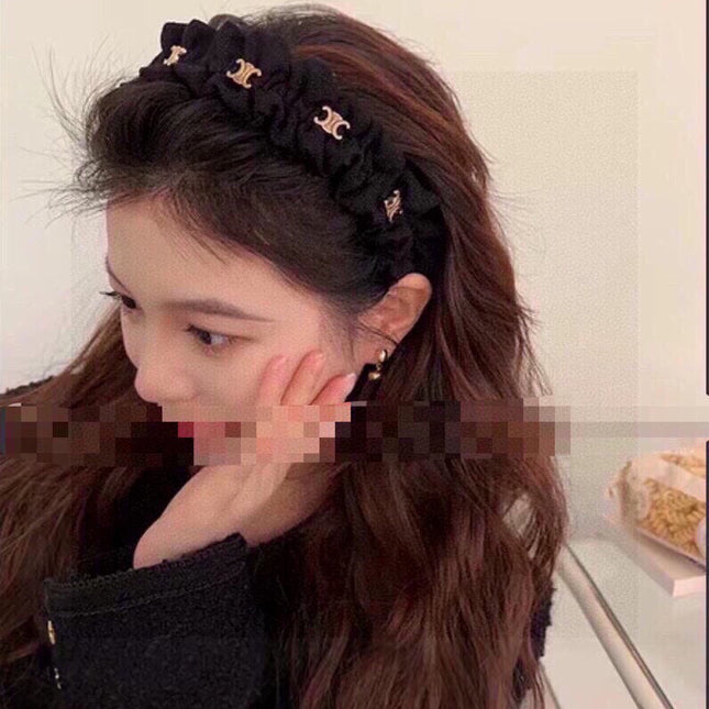 BLACK FABRIC WITH GOLD LOGO HAIRBAND 415931