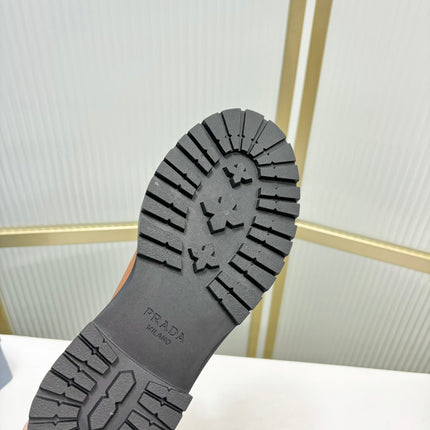 KNEE BOOTS WITH TRIANGLE LOGO IN CAMEL CALFSKIN