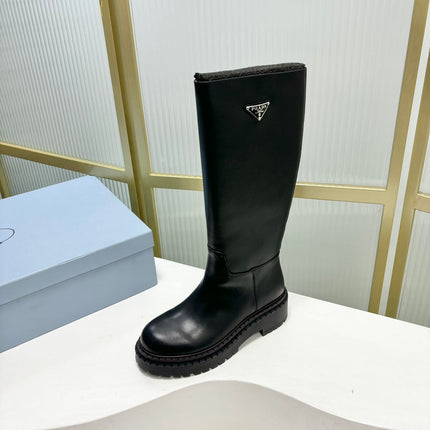 KNEE BOOTS WITH TRIANGLE LOGO IN BLACK CALFSKIN