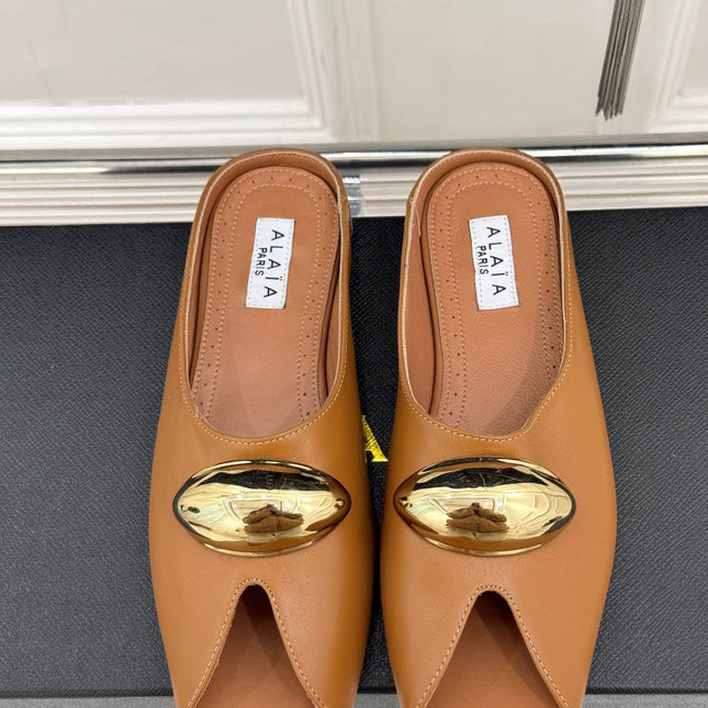 ALAIA FLAT MULE IN BRONZE BROWN LAMBSKIN WITH GOLD HARDWARE