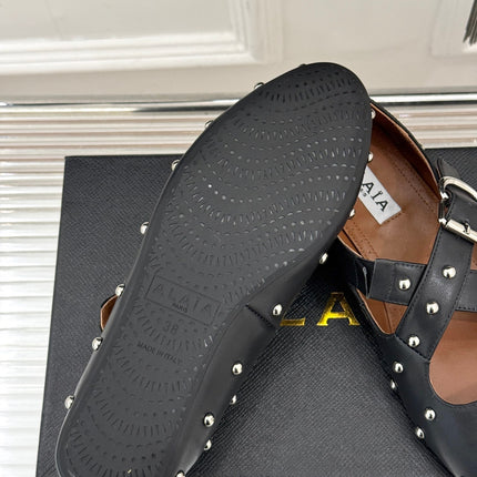 CROSSED STRAP BALLET FLATS IN BLACK CALFSKIN