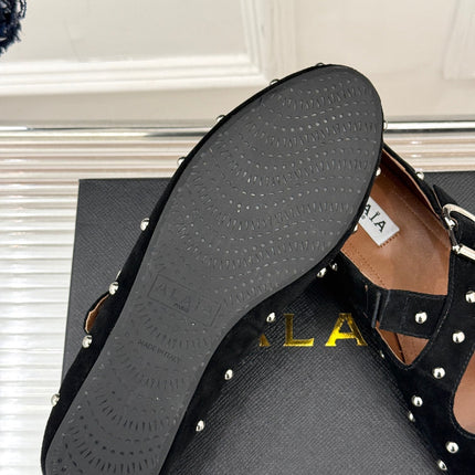 CROSSED STRAP BALLET FLATS IN BLACK SUEDE