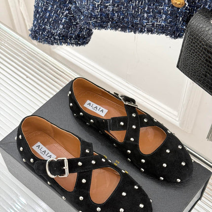 CROSSED STRAP BALLET FLATS IN BLACK SUEDE