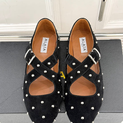 CROSSED STRAP BALLET FLATS IN BLACK SUEDE