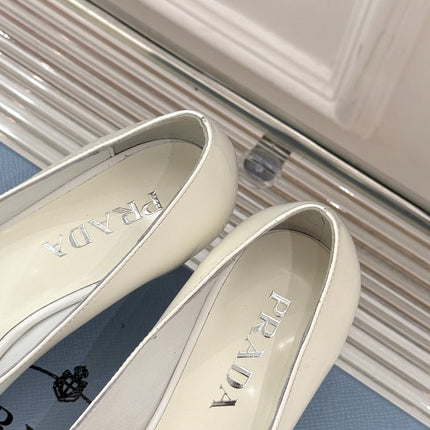 KITTEN HEEL PUMPS IN WHITE CALFSKIN