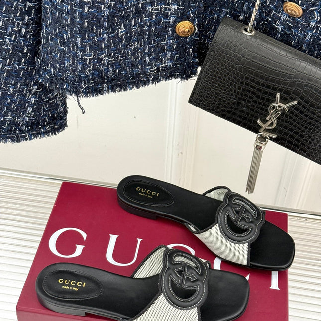 SLIDE SANDALS IN BLACK AND WHITE CALFSKIN