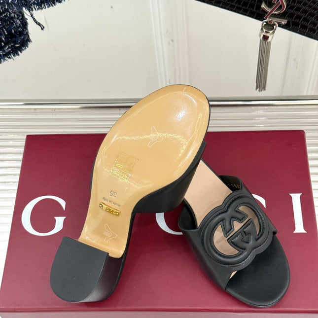 MID-HEEL MULE IN BLACK CALFSKIN