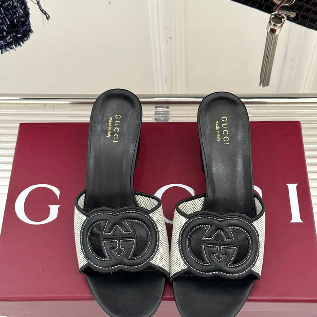 MID-HEEL MULE IN BLACK CALFSKIN AND CREAM WHITE FABRIC