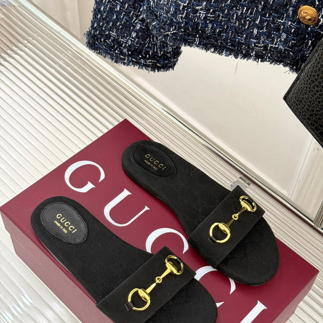 SLIDE SANDALS IN BLACK FABRIC EMBOSSED LOGO