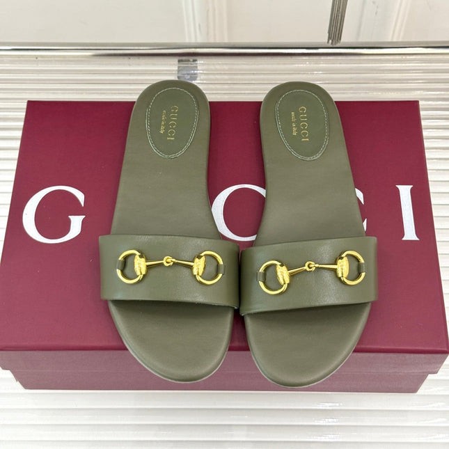 SLIDE SANDALS IN MOSS GREEN CALFSKIN WITH GOLD HARDWARE