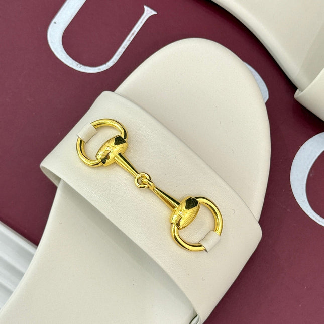 SLIDE SANDALS IN WHITE CALFSKIN WITH GOLD HARDWARE