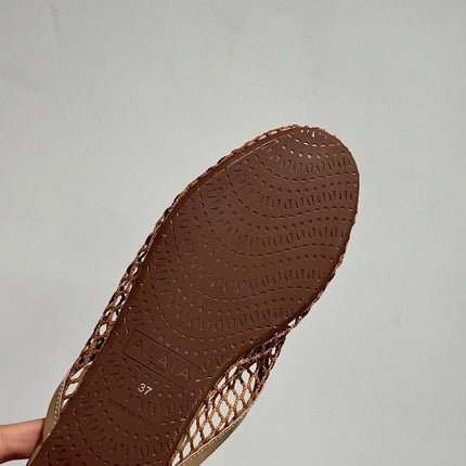ALAIA FLAT MULES IN COPPER BROWN MESH FISHNET