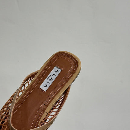 ALAIA FLAT MULES IN COPPER BROWN MESH FISHNET