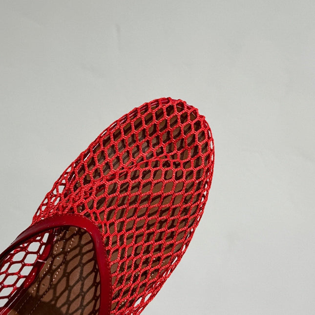 ALAIA FLAT MULES IN CHERRY RED MESH FISHNET