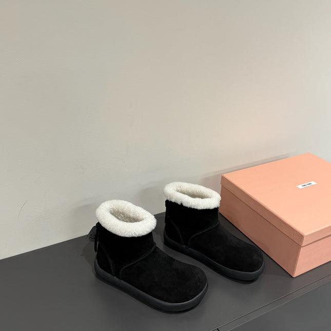 ANKLE BOOTS IN BLACK SUEDE AND FLEECE LINING
