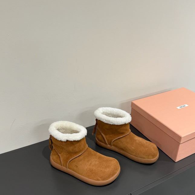 ANKLE BOOTS IN BRONZE BROWN SUEDE AND FLEECE LINING