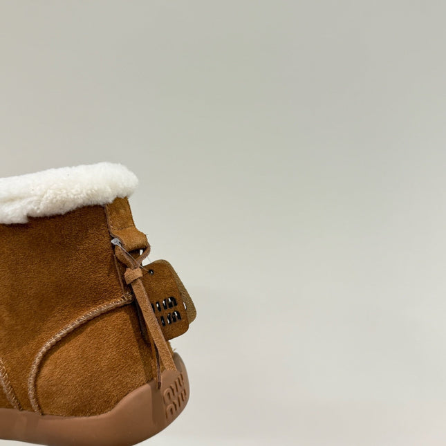 ANKLE BOOTS IN BRONZE BROWN SUEDE AND FLEECE LINING