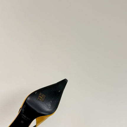 GREEN GEM-STUDDED SLINGBACK PUMPS IN YELLOW PATENT CALFSKIN