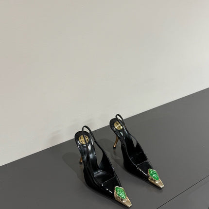 GREEN GEM-STUDDED SLINGBACK PUMPS IN BLACK PATENT CALFSKIN