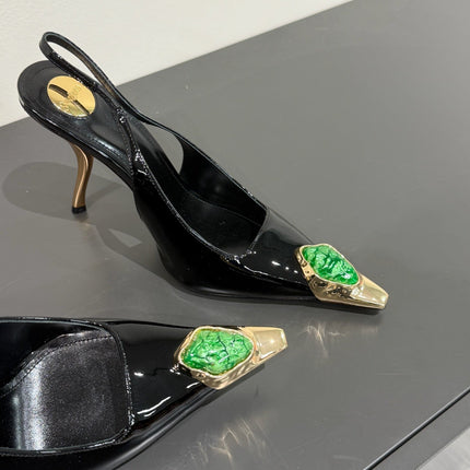 GREEN GEM-STUDDED SLINGBACK PUMPS IN BLACK PATENT CALFSKIN