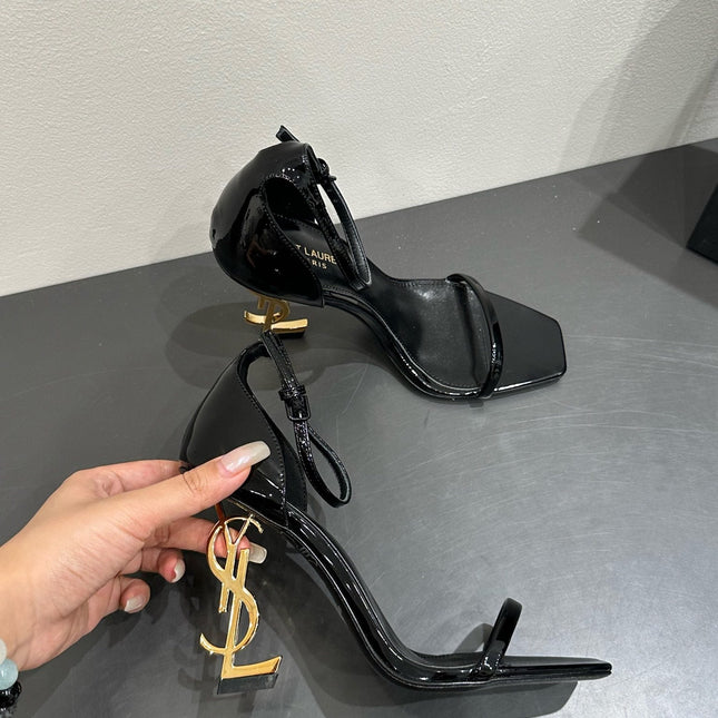 YSL HEELED SANDALS 25S 105 MM IN BLACK GLOSSY LAMBSKIN WITH GOLD HARDWARE