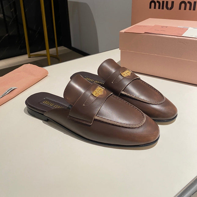 MULES SLIPPERS CHOCOLATE COLOR COWHIDE WITH GOLD COIN