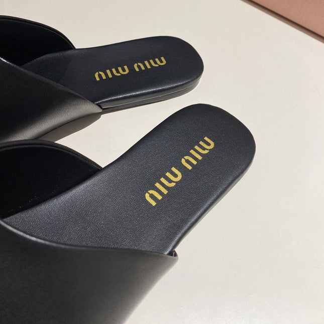 MULES SLIPPERS RETRO BLACK COWHIDE