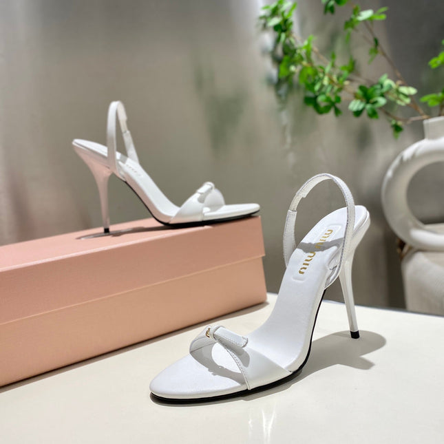 TWO STRAP HIGH HEELED SANDALS IN WHITE GLOSSY SHEEPSKIN