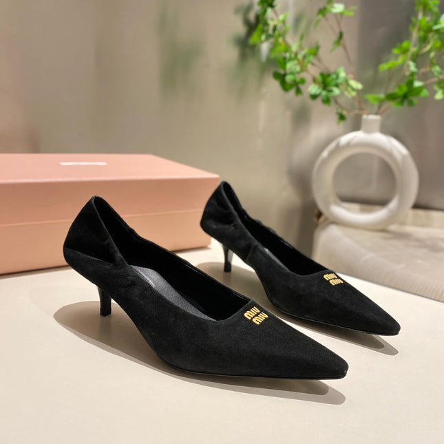 POINTED-TOE MID HEEL PUMPS IN BLACK SUEDE