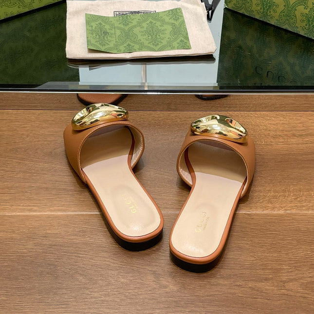 FLAT MULE IN BRONE BROWN CALFSKIN WITH GOLD HARDWARE