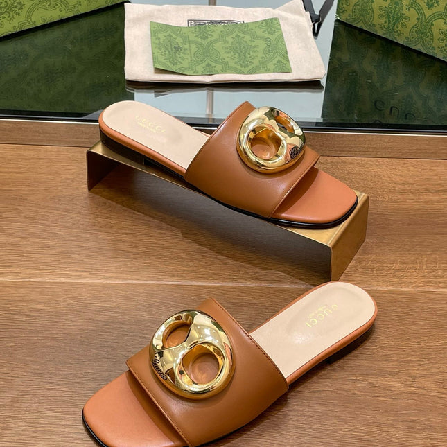 FLAT MULE IN BRONE BROWN CALFSKIN WITH GOLD HARDWARE