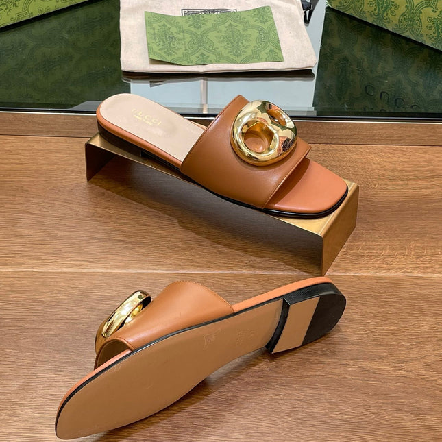 FLAT MULE IN BRONE BROWN CALFSKIN WITH GOLD HARDWARE