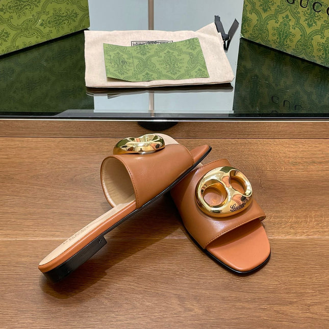 FLAT MULE IN BRONE BROWN CALFSKIN WITH GOLD HARDWARE