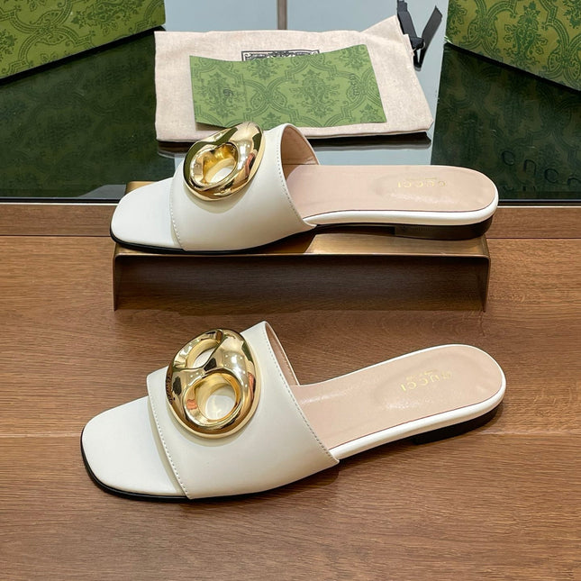 FLAT MULE IN WHITE CALFSKIN WITH GOLD HARDWARE