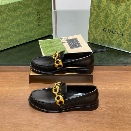 GG LOAFER SHOES IN BLACK CALFSKIN WITH GOLD HARDWARE