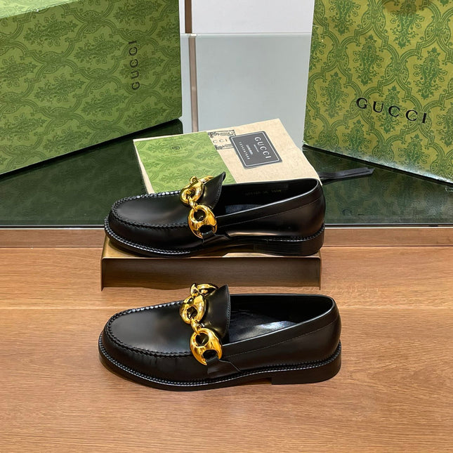 GG LOAFER SHOES IN BLACK CALFSKIN WITH GOLD HARDWARE