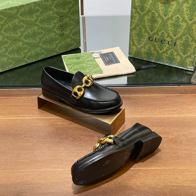 GG LOAFER SHOES IN BLACK CALFSKIN WITH GOLD HARDWARE