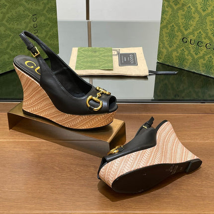 GG WEDGE PLATFORM IN BLACK CALFSKIN WITH GOLD HARDWARE