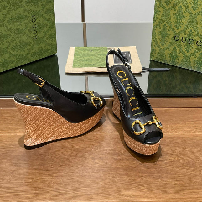 GG WEDGE PLATFORM IN BLACK CALFSKIN WITH GOLD HARDWARE