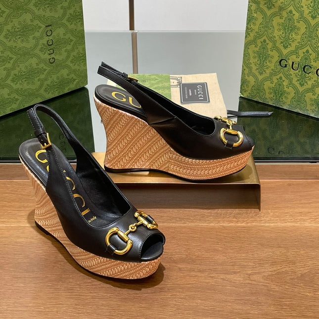 GG WEDGE PLATFORM IN BLACK CALFSKIN WITH GOLD HARDWARE