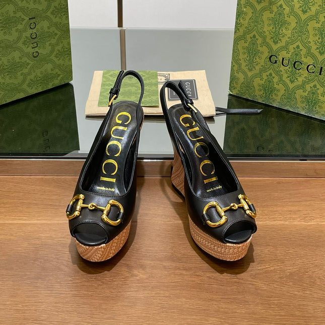 GG WEDGE PLATFORM IN BLACK CALFSKIN WITH GOLD HARDWARE