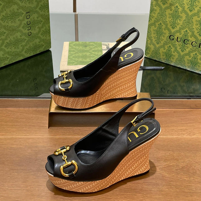 GG WEDGE PLATFORM IN BLACK CALFSKIN WITH GOLD HARDWARE