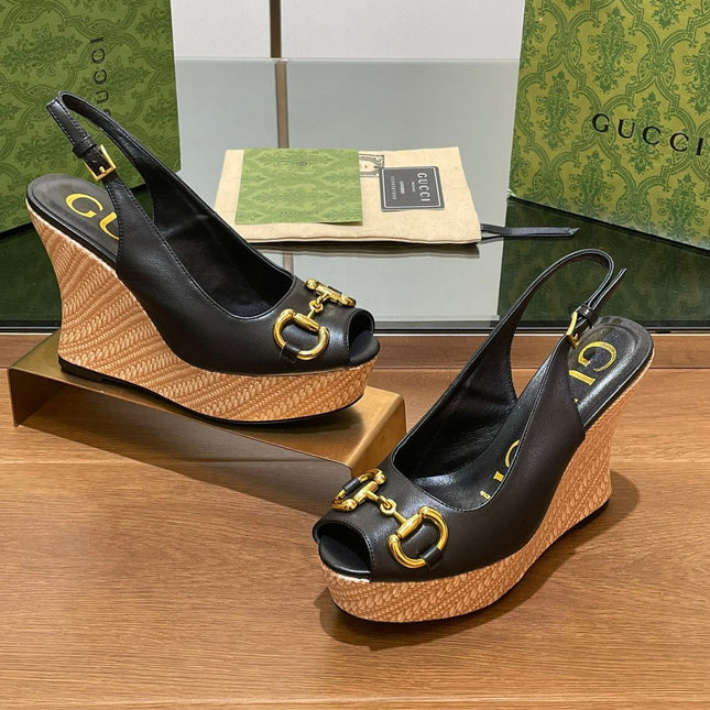 GG WEDGE PLATFORM IN BLACK CALFSKIN WITH GOLD HARDWARE