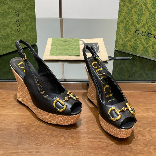 GG WEDGE PLATFORM IN BLACK CALFSKIN WITH GOLD HARDWARE