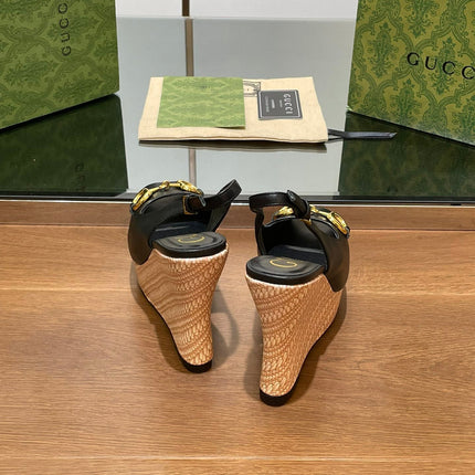 GG WEDGE PLATFORM IN BLACK CALFSKIN WITH GOLD HARDWARE