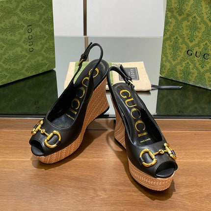 GG WEDGE PLATFORM IN BLACK CALFSKIN WITH GOLD HARDWARE