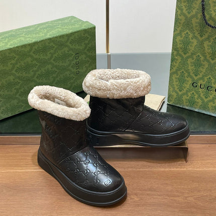 GG SNOW BOOTS IN BLACK EMBOSSED DEERSKIN AND BEIGE WOOL LINING